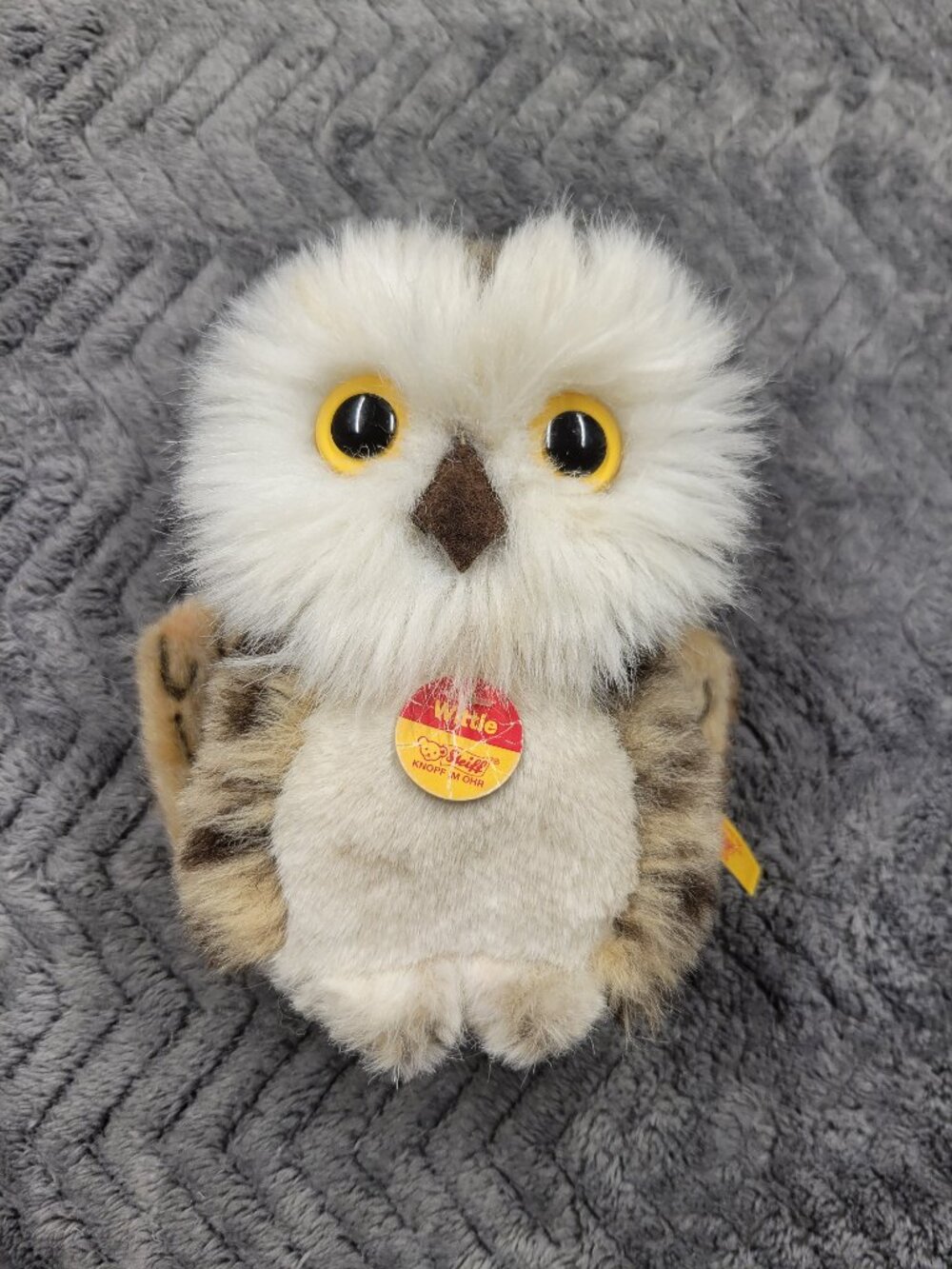 Stiff white owl plush